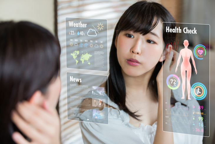 Woman using smart mirror
